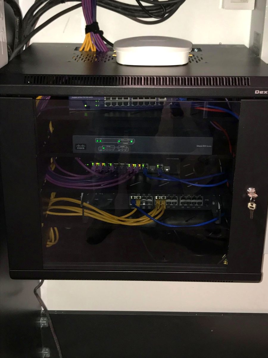 Lockable wall cabinet with switch, router and Wi-Fi access point
